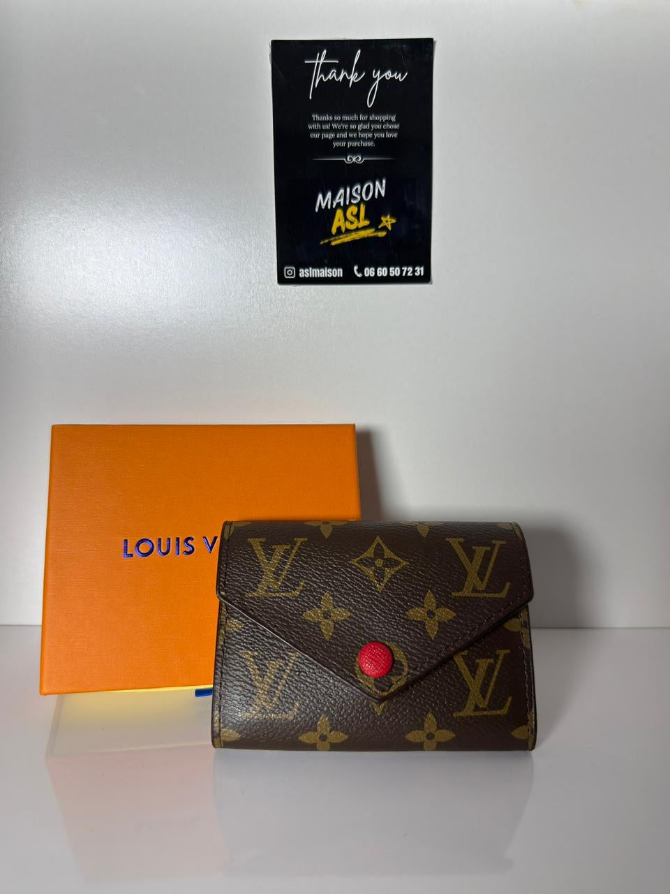 Portefeuille Lv intérieur rouge